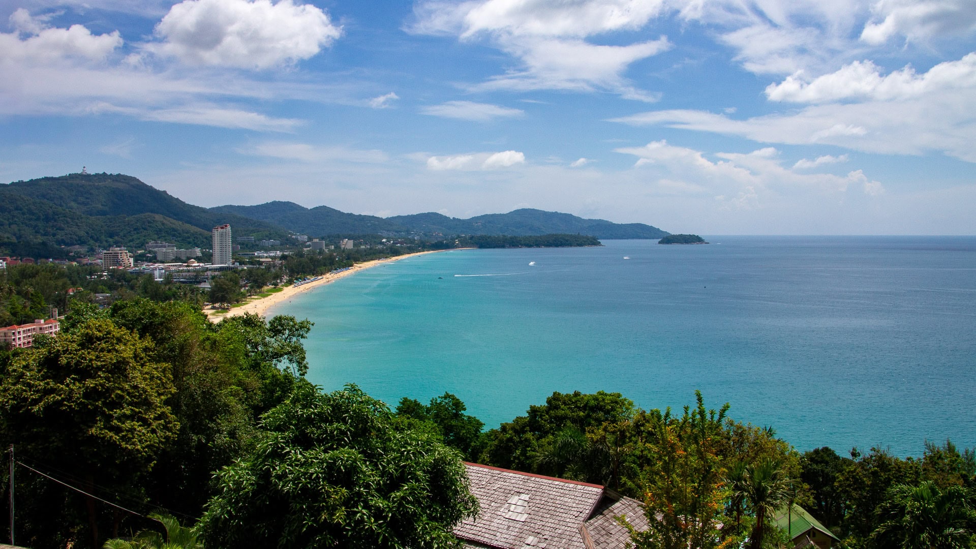 Panoramic view of Karon Beach Phuket coastline from an elevated viewpoint