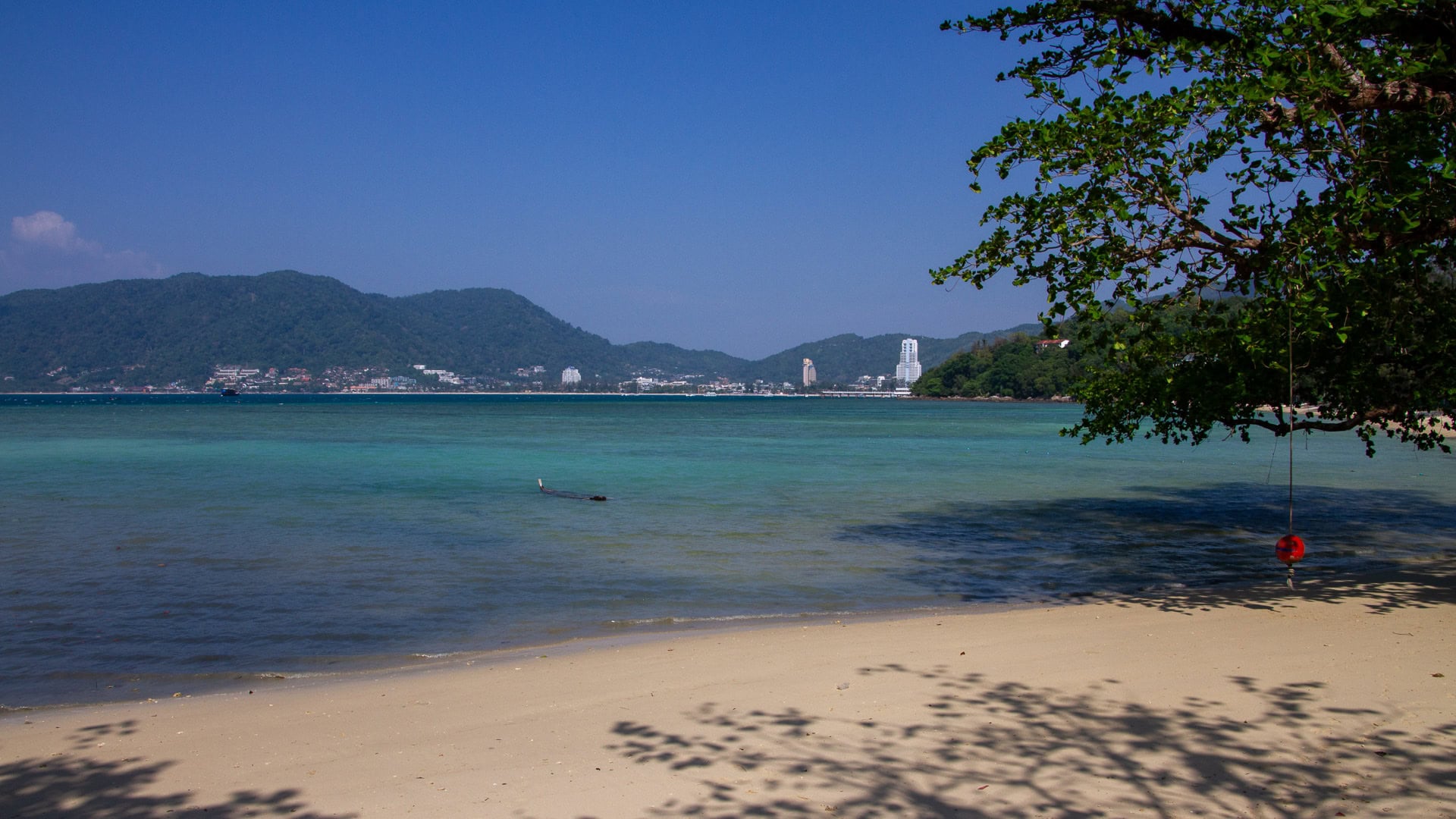 Tri Trang Beach Phuket view across the bay toward Patong headland