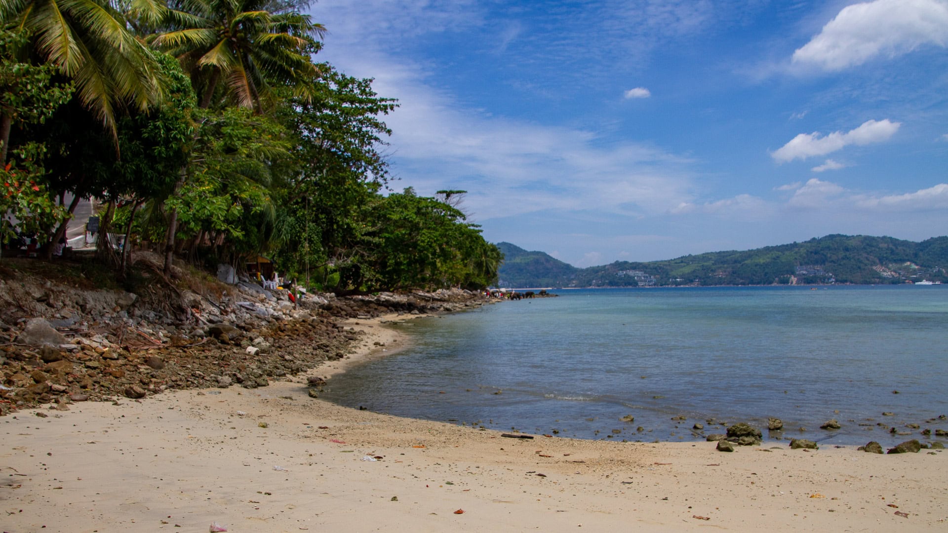 Tri Trang Beach Phuket sign and roadside access near the beach