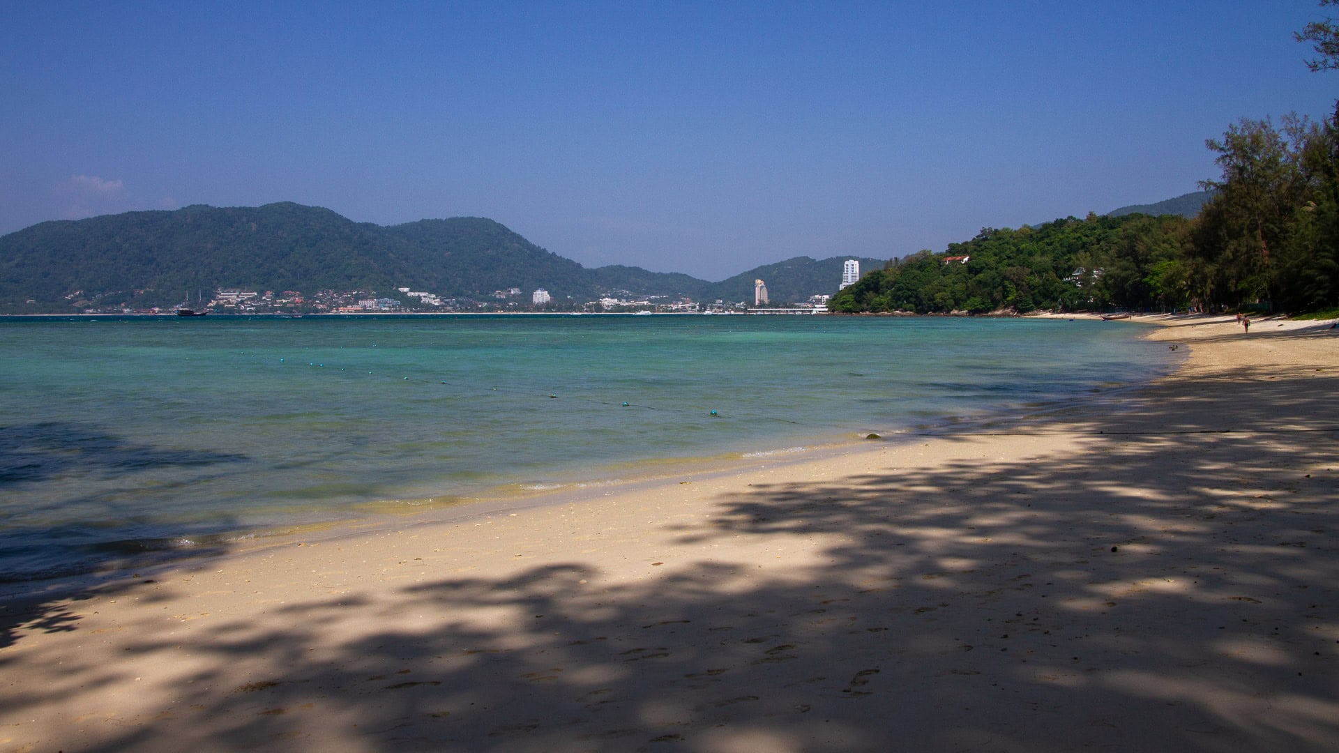 Tri Trang Beach Phuket wide sheltered bay with shallow turquoise water