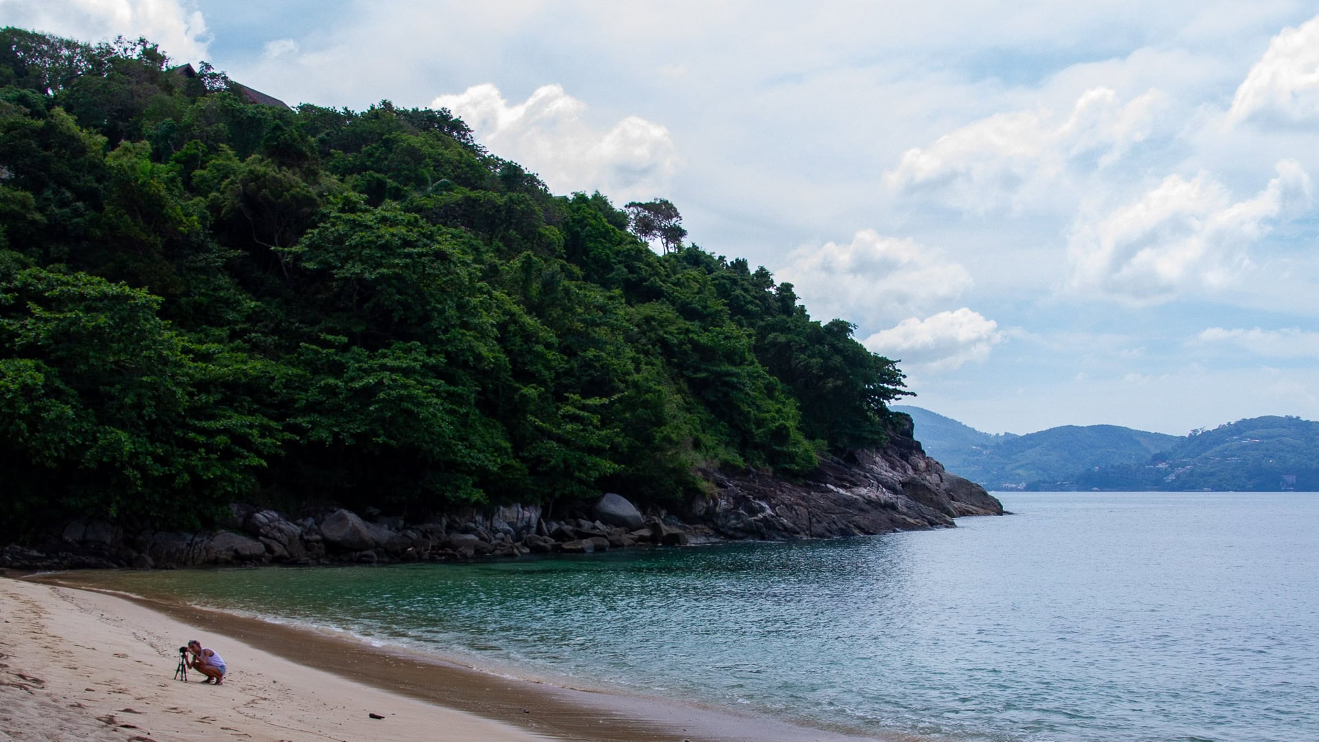 Yae Beach Phuket granite rocks and clear shallow water near the shore